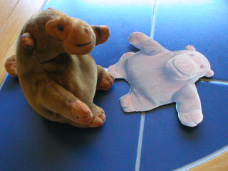 Mr Monkey looking at the cut out monkey