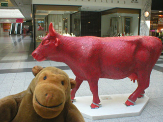 Mr Monkey with a red cow