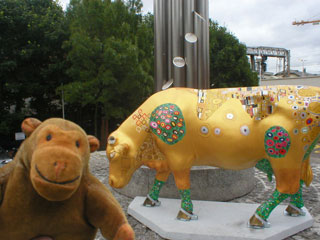 Mr Monkey with a golden cow