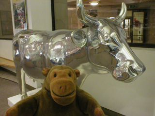 Mr Monkey with a silver cow