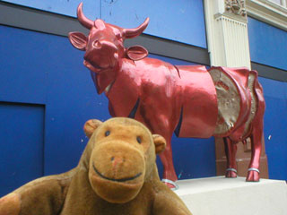 Mr Monkey with a sugary red cow, slightly sliced