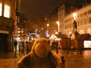 Mr Monkey looking at the German Christmas Market in St Anne's Square
