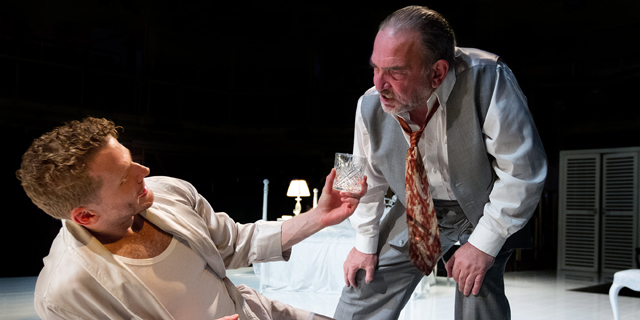 Brick (Charles Aitken) discusses his drinking habits with Big Daddy (Daragh O'Malley) ( Royal Exchange Theatre production photo)