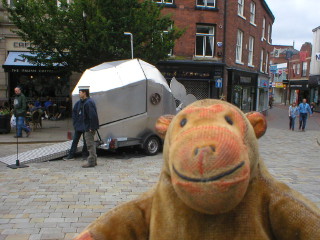 Mr Monkey looking at the whale in the Market Place