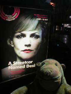 Mr Monkey looking at the poster for A Streetcar Named Desire