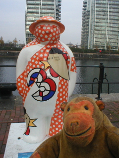 Mr Monkey looking at the Three French Hens snowman