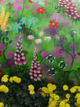 Detail of Lillian Phibian's back, with live flowers