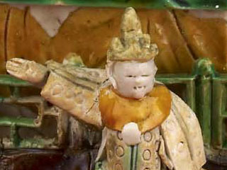 A porcelain actor in a Qing dynasty model theatre