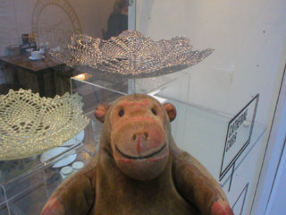 Mr Monkey looking at glasswork by Catherine Parr