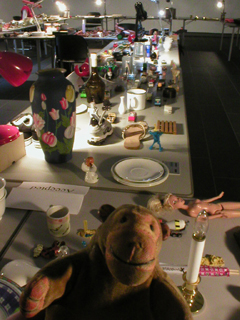 Mr Monkey looking at the donated items