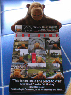 Mr Monkey holding a copy of the Vine
