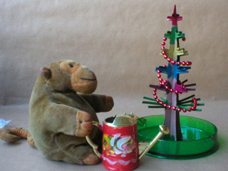 Mr Monkey watering his tree