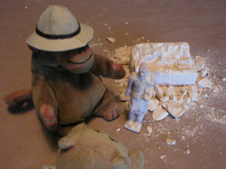 Mr Monkey and Mr Cat admiring the rather small warrior