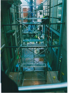 Looking down on a glass door being replaced