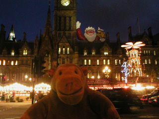 Mr Monkey looking at Albert Square in the dark