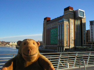 Mr Monkey looking at BALTIC from the Millennium Bridge
