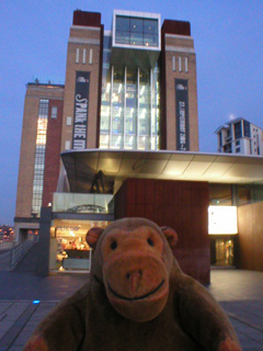 Mr Monkey outside BALTIC at dusk