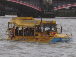 A London Duck DUKW swimming up the Thames