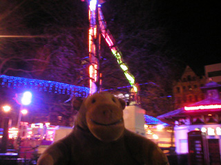 Mr Monkey looking around the fairground in Leicester Square
