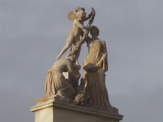Statues on top of Covent Garden market