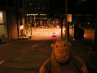 Mr Monkey looking down Madison Street