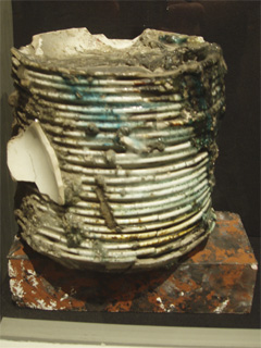 A stack of plates fused together by the fire