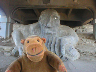 Mr Monkey under Aurora Bridge looking at the Fremont Troll