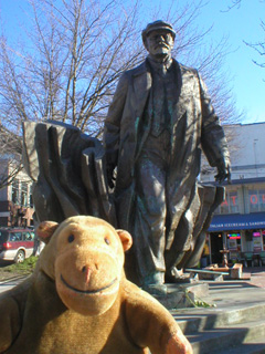 Mr Monkey in front of the statue of Lenin