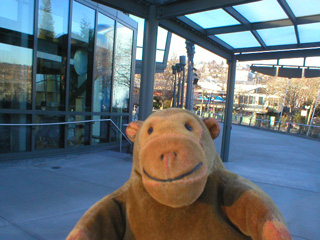 Mr Monkey outside the Space Needle ticket office