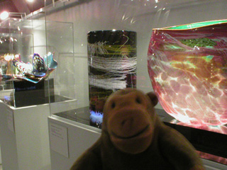 Mr Monkey looking at some Dale Chihuly glass