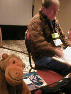 Mr Monkey watching Robert S. Napier demonstrating a Plot Genie