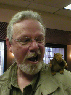 Mr Monkey sitting on Peter May's shoulder