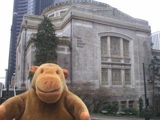 Mr Monkey walking towards the First United Methodist Church