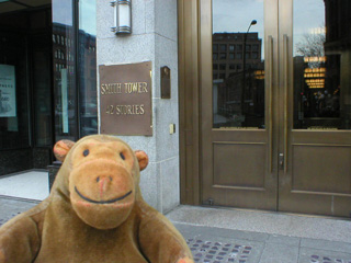 Mr Monkey outside the front door of Smith Tower