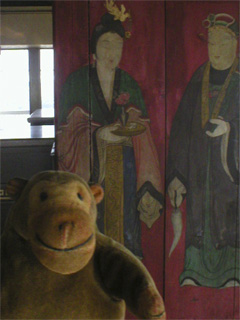 Mr Monkey looking at furniture in the Chinese Room