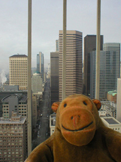 Mr Monkey looking down 2nd Avenue from Smith Tower
