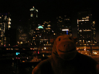 Mr Monkey looking at downtown Seattle from the ferry