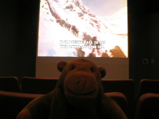 Mr Monkey watching a film about the Klondike gold rush