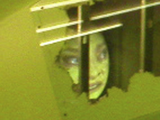 A giant egg with a face projected onto it