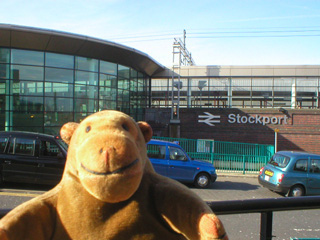 Mr Monkey outside Stockport station