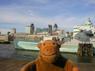 Mr Monkey looking at HMS Belfast from the Thames path