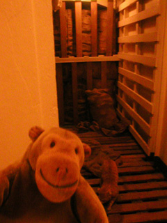 Mr Monkey peering into the potato store