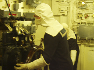 A mannequin steering HMS Belfast