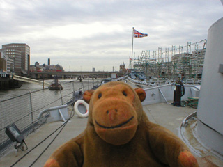 Mr Monkey looking towards the prow of HMS Belfast