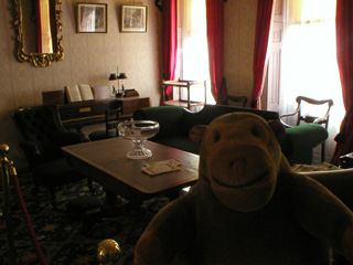 Mr Monkey looking at Dickens' drawing room