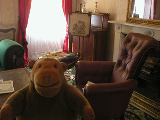 Mr Monkey looking at the Cruikshank Chair
