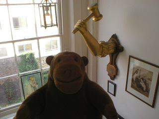 Mr Monkey looking downstairs at the goldbeaters arm