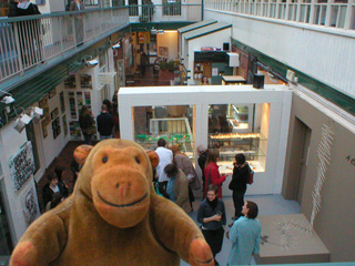 Mr Monkey watching the crowd looking at the Coastal Archive exhibition