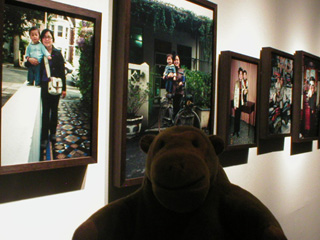 Mr Monkey looking at Annie Hsiao-Ching Wang's My son and I at the same height