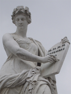 The statue of Liberty holding a plaque